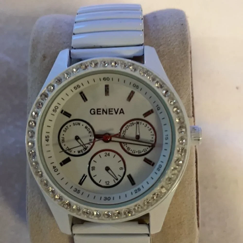 Geneva Ladies Analog Watch White Face Rhinestones White Metal Stretch Band